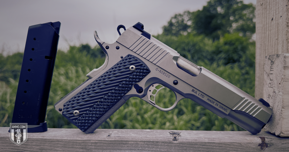 45 ACP 1911 with extended magazine, illustrating the higher round count of a double-stack 45 ACP pistol versus a 357 Magnum revolver
